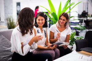 ladies discussing tips for scaling a small business